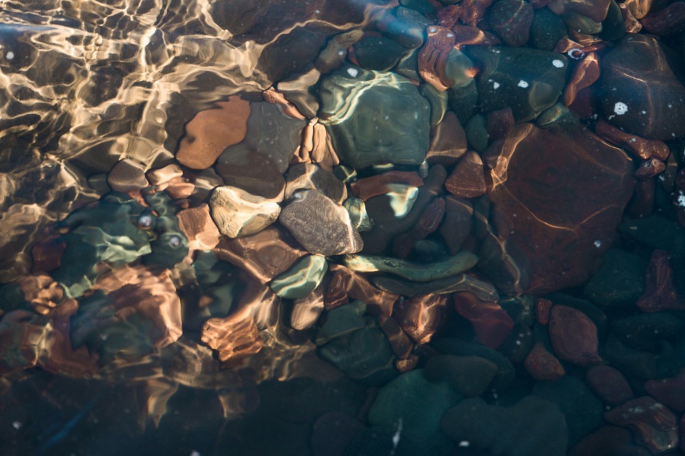 lake water on rocky shore
