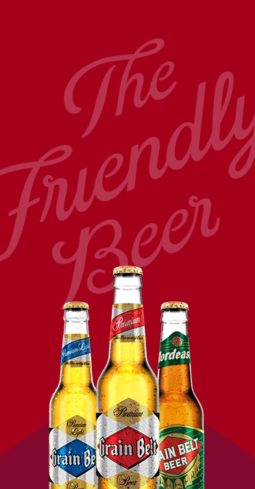 bottles of grain belt beer against a red background that says "the friendly beer"